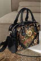 Vintage Victorian Bowler Bag by Fae & Magpie featuring leather texture, brass hardware, and classic rounded shape.