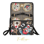 Handbag with playing card design on a white background