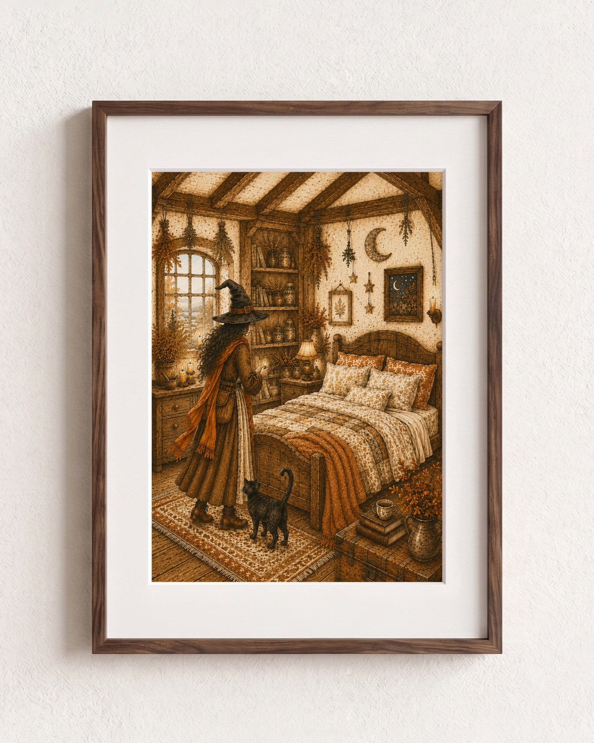 A framed art print featuring a cozy, vintage-style witch's bedroom scene with a witch in a pointed hat standing by a bed next to a black cat. The print is presented with a white mat and a dark brown wooden frame, hanging on a textured off-white wall.