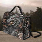 Handbag with dragon design on a wooden surface