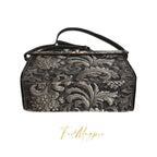 Floral embossed handbag on a white background with 'Fae & Magpie' branding.