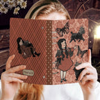 Girl and dog planner by Fae & Magpie with colorful pages and floral cover design, perfect for organizing daily activities.