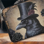 Fae & Magpie Crow laptop sleeve in black fabric, slim case with soft interior and zipper closure for 13-inch laptops.
