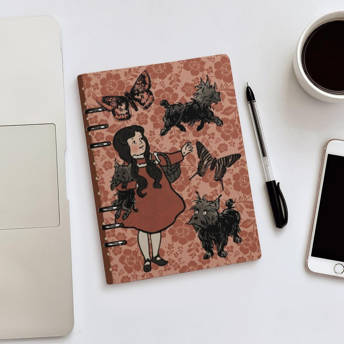 Girl and dog planner by Fae & Magpie with floral cover and organized pages, suitable for daily planning and note-taking.