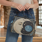 Fae & Magpie Blue Moon vintage handbag with a structured design and leather strap, showcasing a stylish accessory for women.