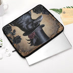 Fae & Magpie Crow laptop sleeve in black with soft interior, designed for protecting 13-inch laptops in a stylish case.