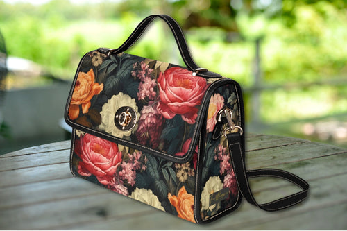 Fae & Magpie Botanical Satchel Bag with floral pattern, leather accents, and adjustable strap, stylish for everyday use.