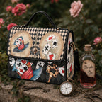 Handbag with playing card design, bottle labeled 'Drink Me', and key on a floral background