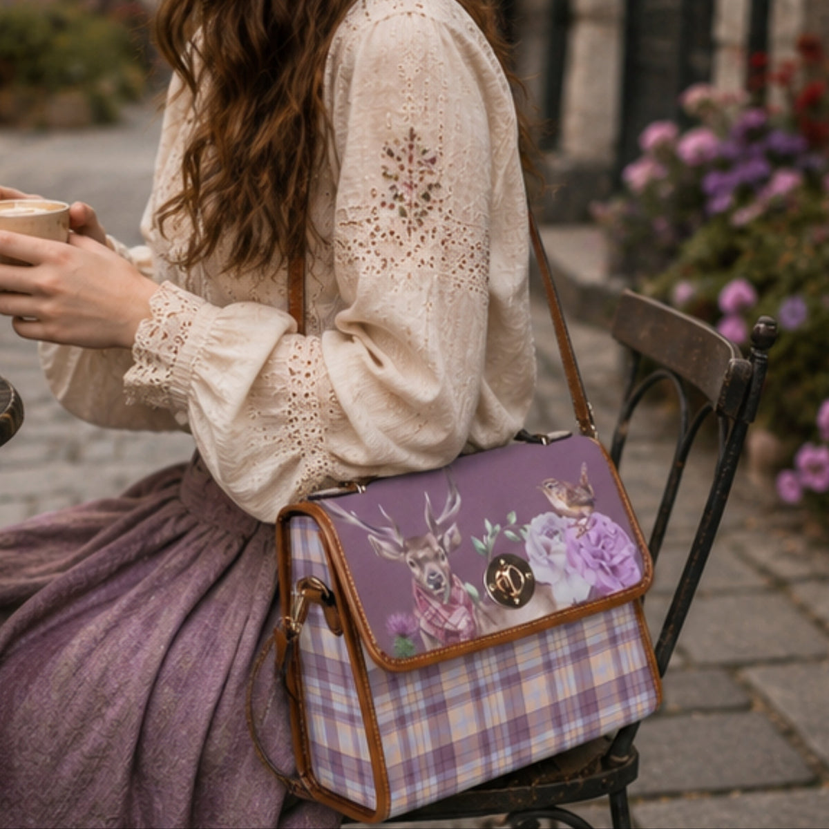 Scottish Highland Fae & Magpie handbag with leather strap and tartan fabric, showcasing a stylish and handcrafted satchel bag design.