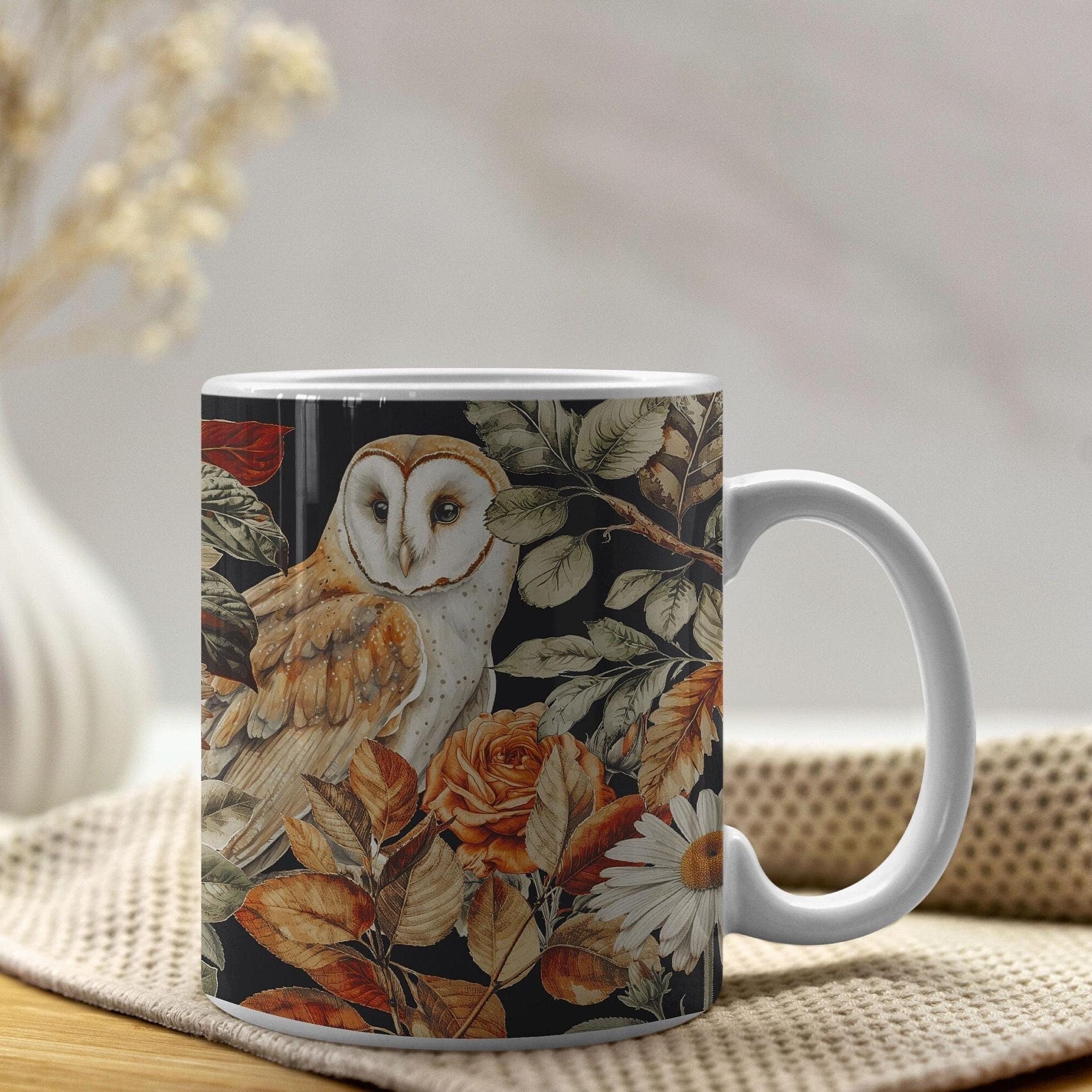 Mug with an owl and floral design on a neutral background
