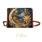 Fae & Magpie Celestial Dreams satchel handbag with celestial pattern, leather strap, and gold-tone accents.