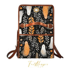 Backpack with ghost and plant pattern on a black background, featuring the brand 'Folk Magpie'.