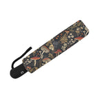 Umbrella with a floral and mushroom pattern on a white background