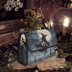 Handbag with witch design on a mystical background with books and flowers.