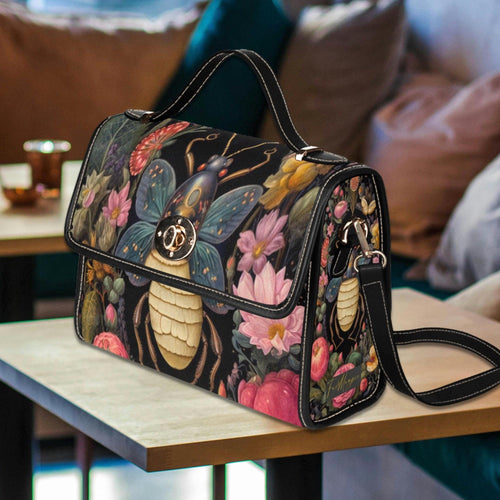 Fae & Magpie Bee Satchel Handbag with woven design, leather strap, and structured shape, stylish accessory for everyday use.
