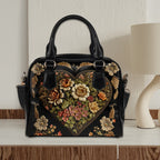 Vintage Victorian bowler bag by Fae & Magpie featuring leather material, metal hardware, and classic design details.