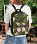Person wearing a floral-patterned backpack outdoors
