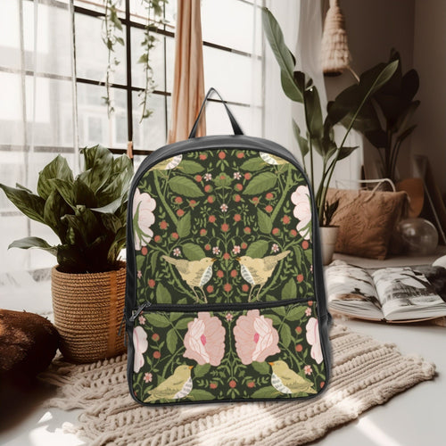 Backpack with floral pattern on a surface with plants and books in the background