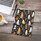 Fae & Magpie Ghosts Halloween Planner with spooky ghost illustrations, featuring pages for organizing Halloween events and decorations.