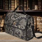 Decorative handbag with floral patterns on a wooden surface with bookshelf background