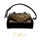 Vintage Victorian bowler bag by Fae & Magpie with leather handles and detailed stitching over a soft fabric body.