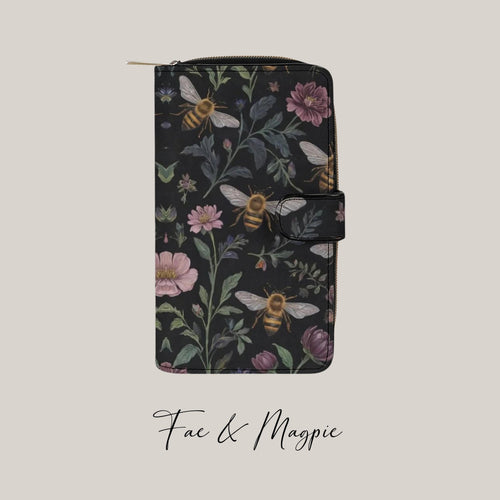 Fae & Magpie Bees Purse, a stylish accessories item with a bee design, featuring vibrant colors and detailed craftsmanship.