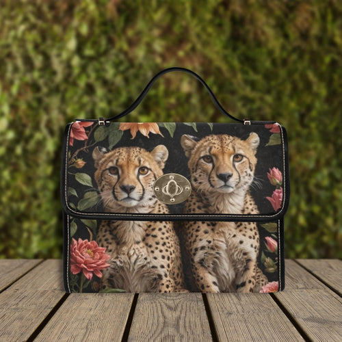 Fae & Magpie cheetah print satchel handbag with top handles and gold accents, stylish accessory for everyday use.