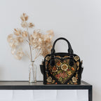 Vintage Victorian Bowler Bag by Fae & Magpie featuring dark leather, brass hardware, and classic rounded shape.