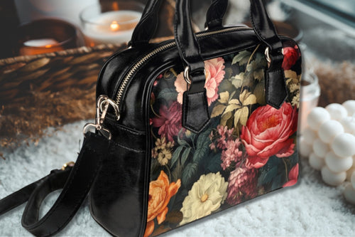 Fae & Magpie botanical floral bowler bag with colorful flower print and sturdy leather handles, stylish and functional accessory.