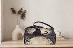 Black cat-shaped satchel bag from Fae & Magpie with a structured design and adjustable strap, perfect for stylish everyday use.