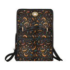 Patterned bag with celestial design on a white background